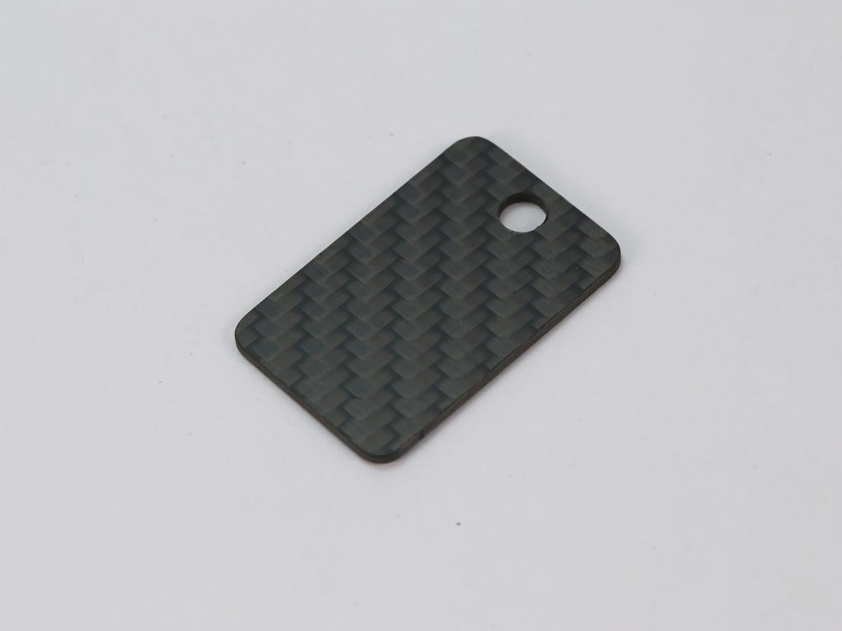 Arrow Tag – Carbon Fiber | Dynamic Form — carbon fiber close-up view 2