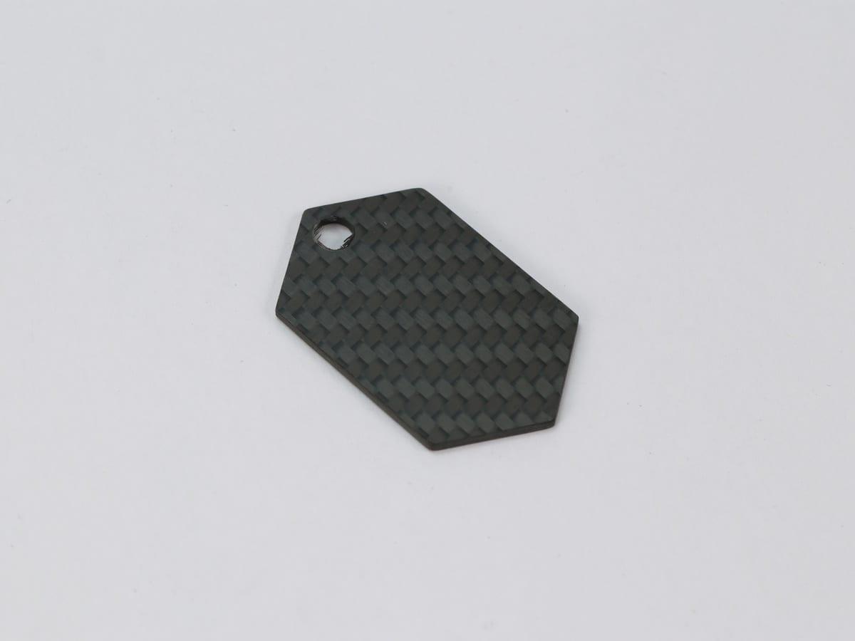 Cross Tag – Carbon Fiber | Symbolic Design — carbon fiber close-up view 2