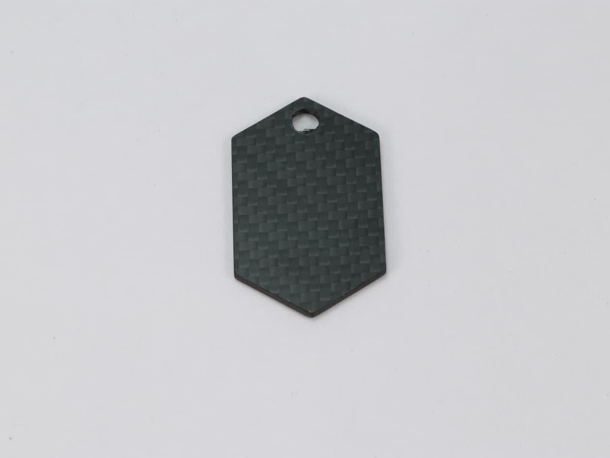 Cross Tag – Carbon Fiber | Symbolic Design