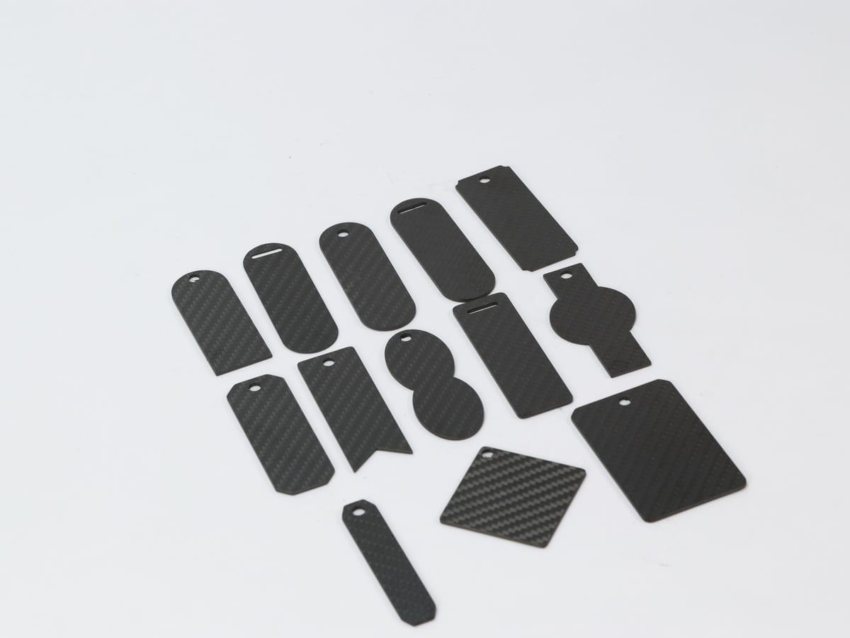 Custom Shape Tag – Carbon Fiber | Your Design, Your Shape — carbon fiber close-up view 2