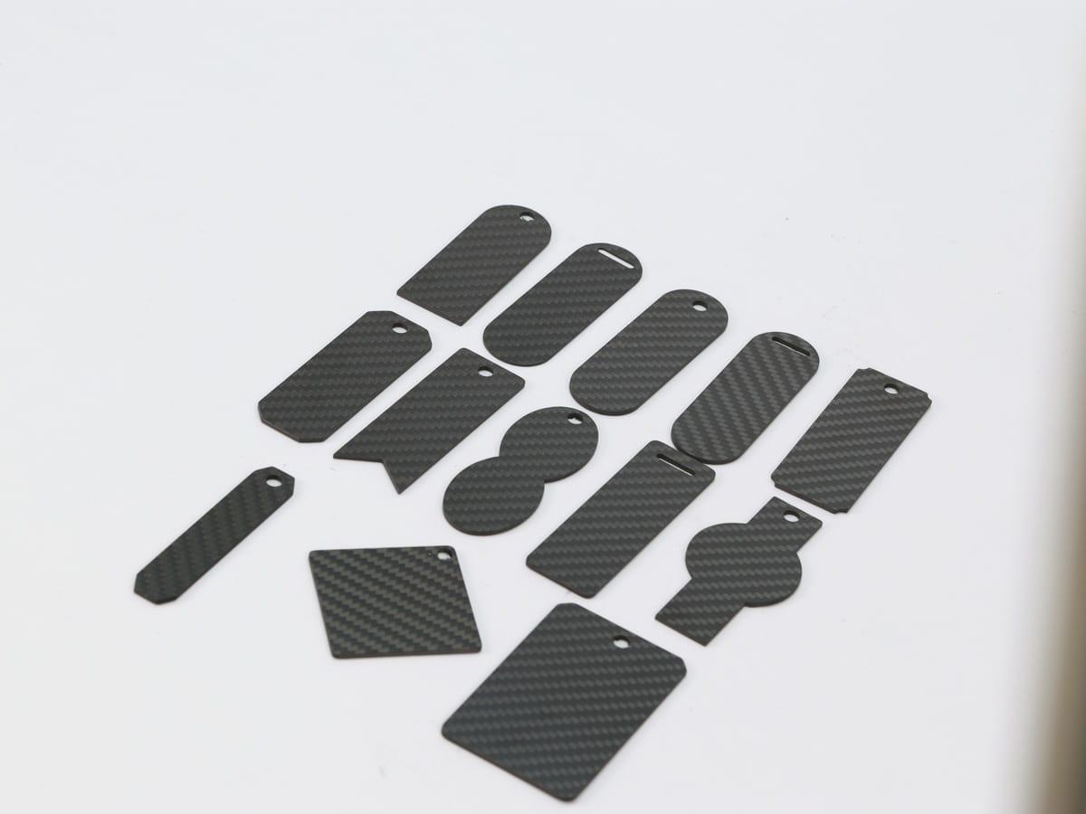 Custom Shape Tag – Carbon Fiber | Your Design, Your Shape — carbon fiber close-up view 3