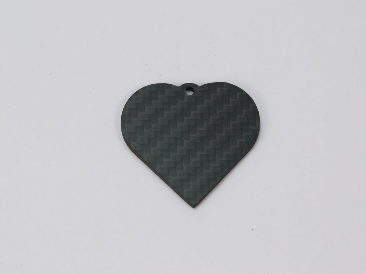 Leaf Tag – Carbon Fiber | Organic Shape — carbon fiber close-up view 1