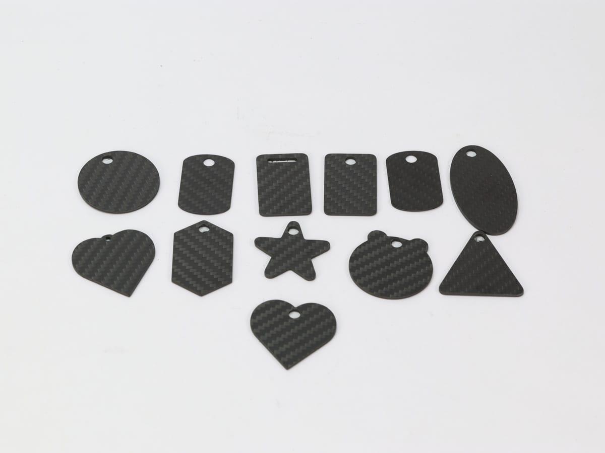 Moon Tag – Carbon Fiber | Subtle Charm — carbon fiber close-up view 1