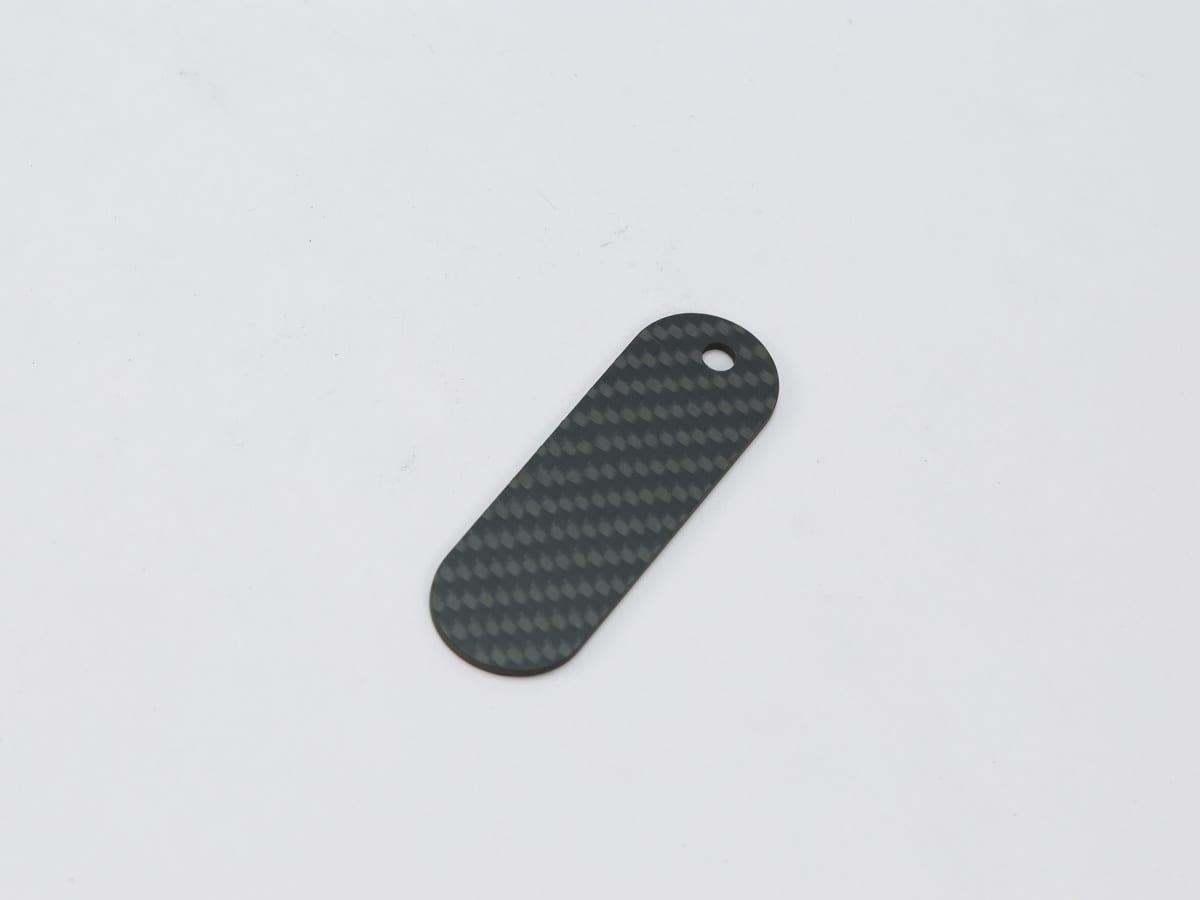 Oval Hang Tag – Carbon Fiber | Classic Elegance — carbon fiber close-up view 3