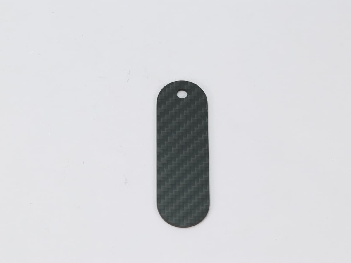 Oval Hang Tag – Carbon Fiber | Classic Elegance