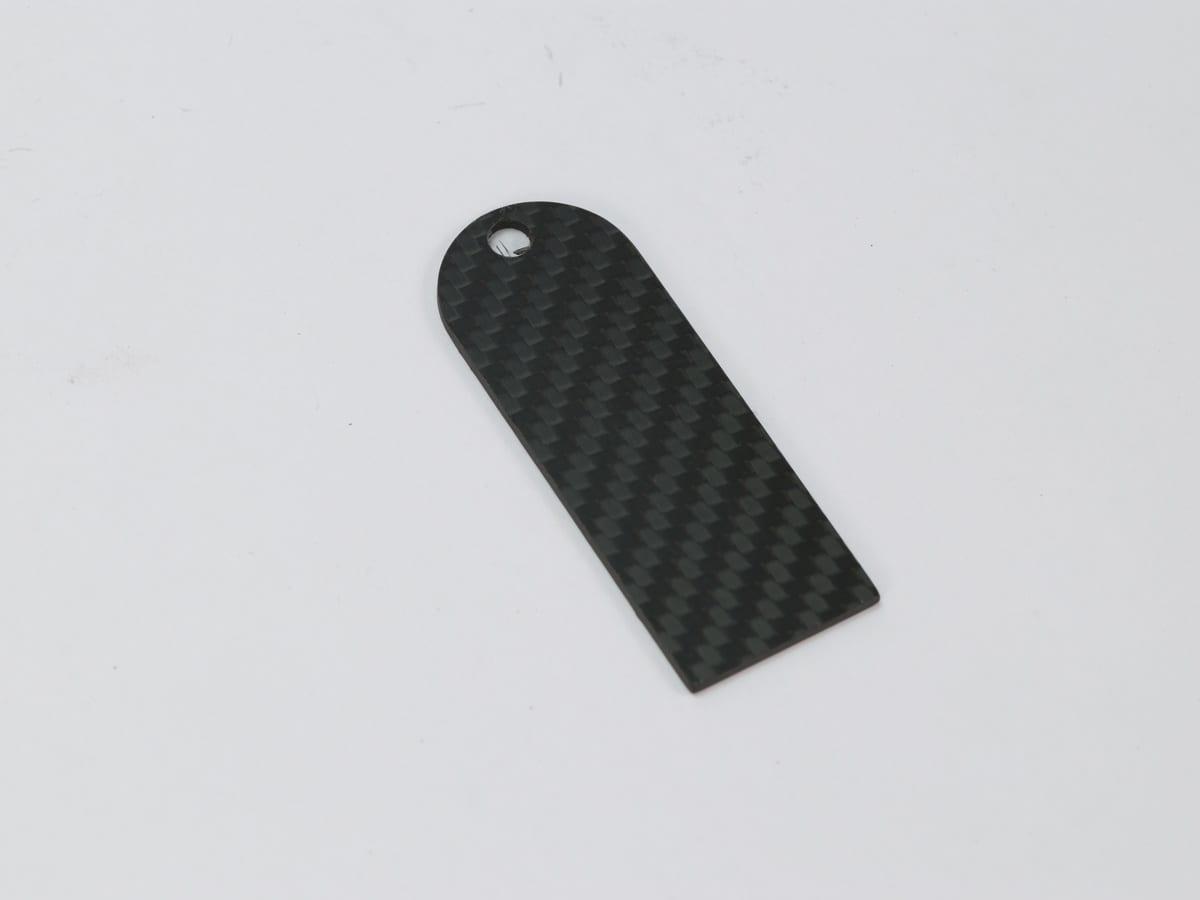 Rounded Hang Tag – Carbon Fiber | Smooth Edges — carbon fiber close-up view 1