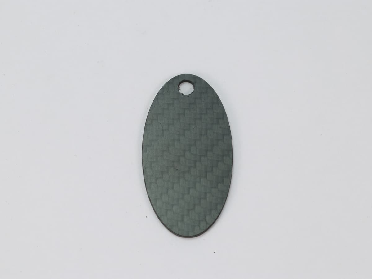 Shield Hang Tag – Carbon Fiber | Bold Statement