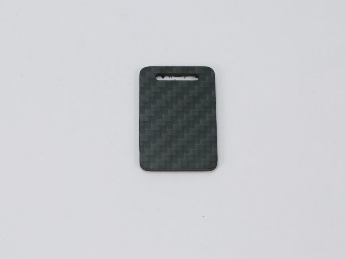 Teardrop Tag – Carbon Fiber | Graceful Curve — carbon fiber close-up view 1