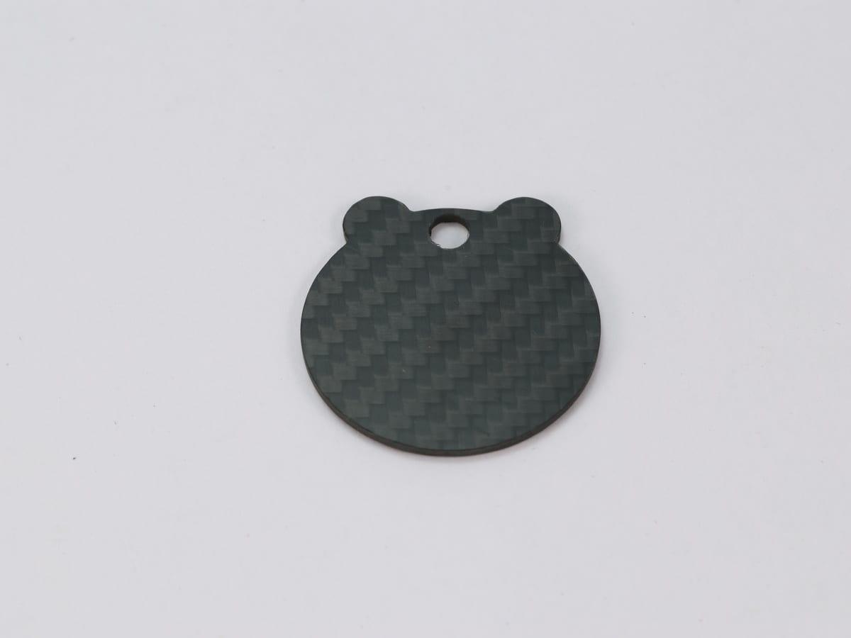 Wave Tag – Carbon Fiber | Flowing Lines — carbon fiber close-up view 1