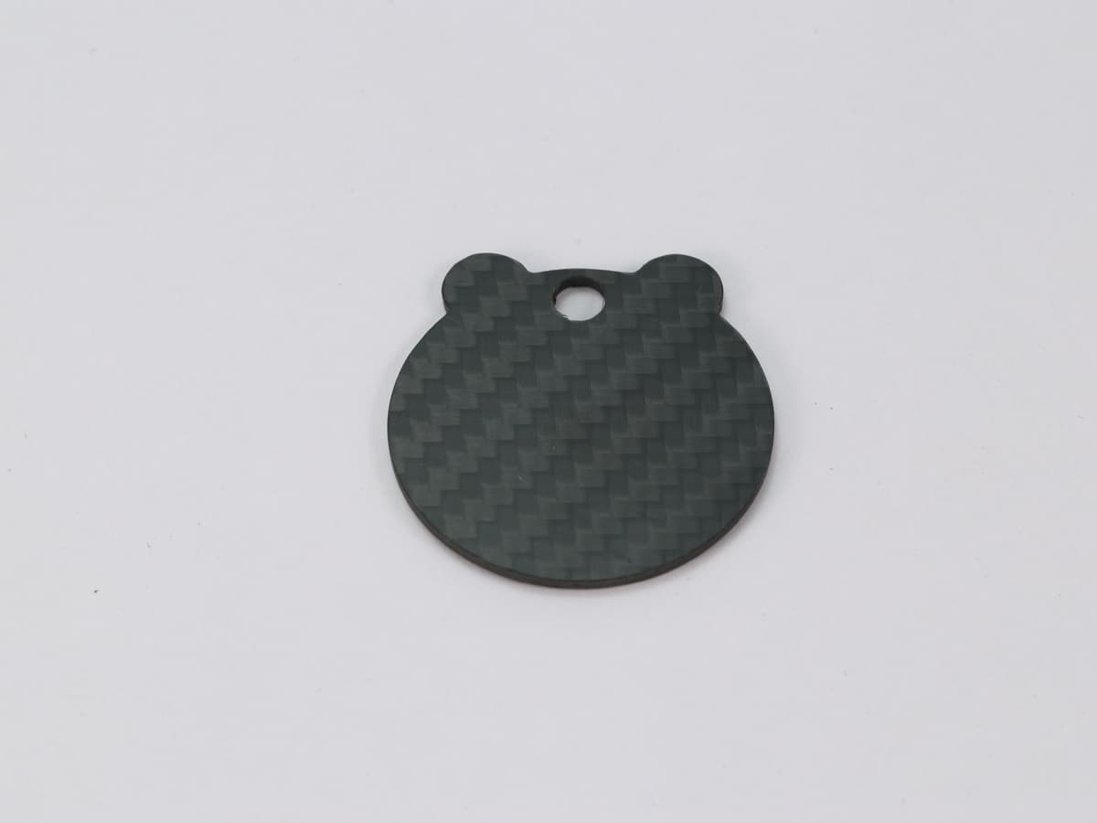 Wave Tag – Carbon Fiber | Flowing Lines