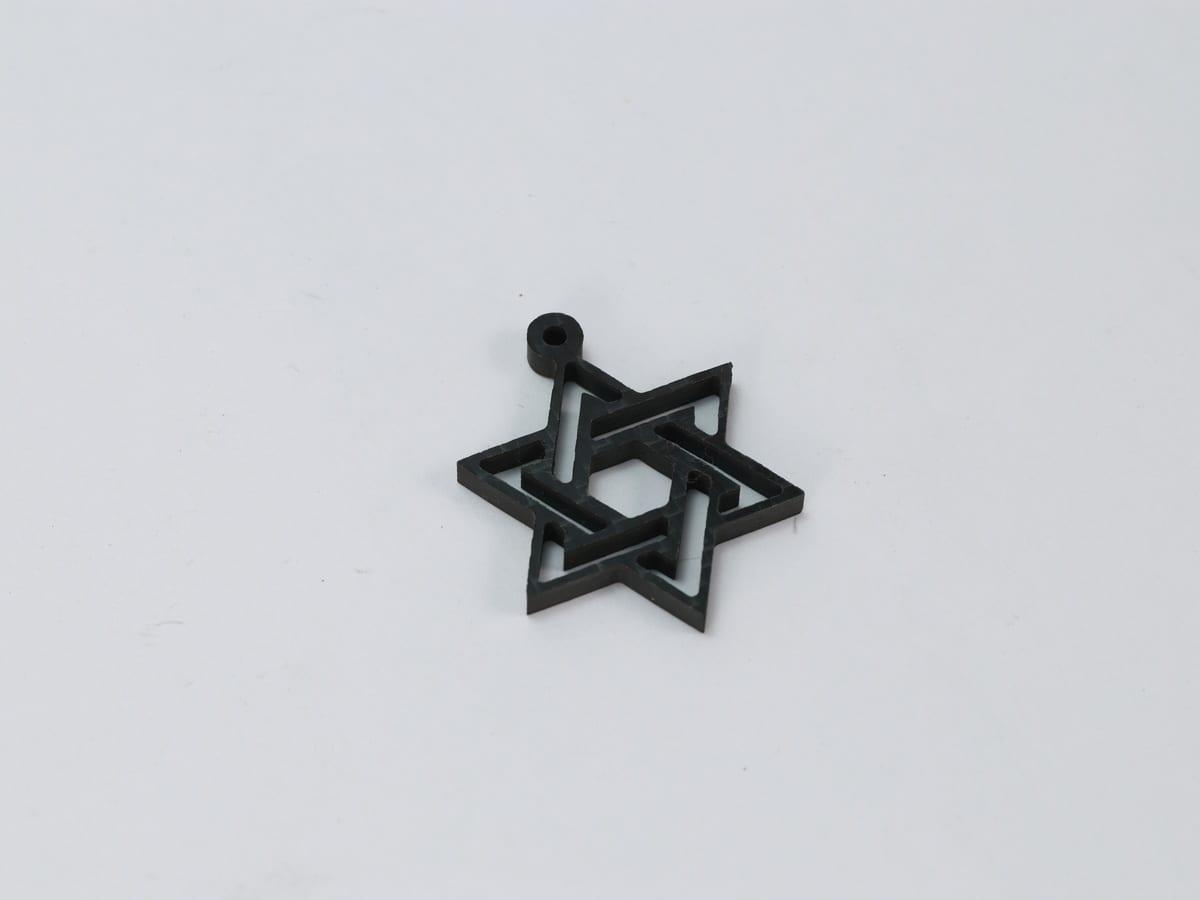 Carbon Fiber Cross Pendant – Ultra-Light 5g | Stainless Steel Bail — carbon fiber close-up view 2