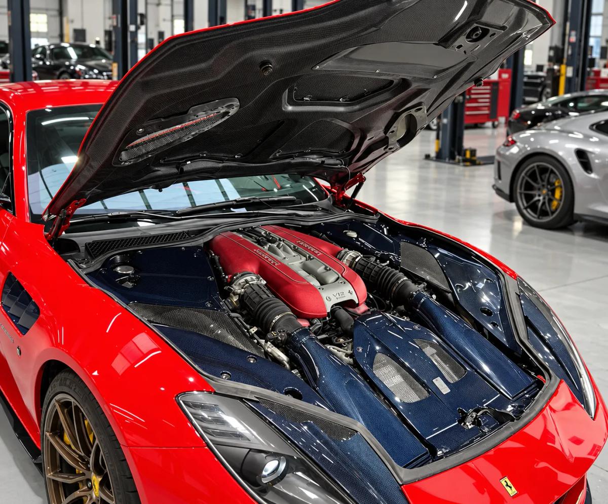 Custom Ferrari 812 Carbon Fiber Engine Bay Cover Kit — carbon fiber close-up view 4
